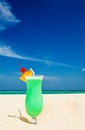 Fruity cocktail is on a beach Royalty Free Stock Photo
