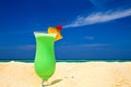 Fruity cocktail is on a beach Royalty Free Stock Photo