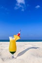 Fruity cocktail is on a beach Royalty Free Stock Photo