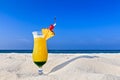 Fruity cocktail is on a beach Royalty Free Stock Photo