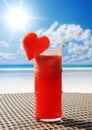 Fruity cocktail on a beach table Royalty Free Stock Photo