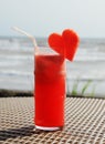 Fruity cocktail on a beach table Royalty Free Stock Photo