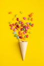 Fruity jellybeans. Tasty colorful jelly beans and waffle cone