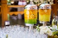 fruity lemonade, fruit refreshing drink, orange juice, catering, glasses for wine or champagne,exit buffet, Lemonade in glass bar Royalty Free Stock Photo