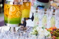 fruity lemonade, fruit refreshing drink, orange juice, catering, glasses for wine or champagne,exit buffet, Lemonade in glass bar Royalty Free Stock Photo