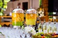 fruity lemonade, fruit refreshing drink, orange juice, catering, glasses for wine or champagne,exit buffet, Lemonade in glass bar Royalty Free Stock Photo