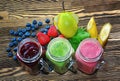 Fruity smoothie on a wooden table. Fruit to create smoothies. Royalty Free Stock Photo