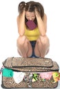 Frustrated Angry Fed Up Young Woman Trying to Close Her Suitcase Royalty Free Stock Photo