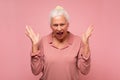 Frustrated and angry senior hispanic woman screaming Royalty Free Stock Photo