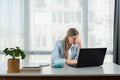 Frustrated annoyed woman confused by computer problem, annoyed businesswoman feels indignant about laptop crash, bad news online Royalty Free Stock Photo