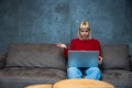 Frustrated annoyed woman confused by computer problem, annoyed businesswoman feels indignant about laptop crash, bad news online Royalty Free Stock Photo