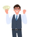 Frustrated, annoyed young businessman in waistcoat showing cash, money and gesturing raised arm fist sign. Angry person holding