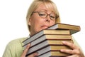 Frustrated Attractive Woman with Stack of Books