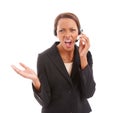 Frustrated black woman, call center and headphones shouting at difficult customer against a white studio background