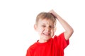 Frustrated boy is tearing his hair out, isolated on white Royalty Free Stock Photo