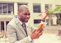 Frustrated business man receiving bad news on mobile phone Royalty Free Stock Photo