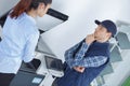 Frustrated business woman opening photocopy machine in office Royalty Free Stock Photo