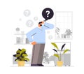 frustrated businessman with question mark looking for assistance help thinking inquiry concept Royalty Free Stock Photo