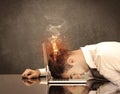 Sad business person`s head catching fire Royalty Free Stock Photo