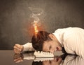 Sad business person`s head catching fire Royalty Free Stock Photo