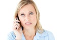 Frustrated businesswoman talking on phone