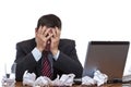 Frustrated desperated man sitting at desk Royalty Free Stock Photo