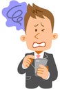 Frustrated expression of a young businessman operating a smartphone