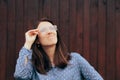 Woman With Foggy Eyeglasses Looking up Squinting Royalty Free Stock Photo