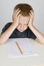 Frustrated little boy doing homeword Royalty Free Stock Photo