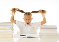 Stressed school girl feeling frustrated and unable to concentrate in her studies Royalty Free Stock Photo