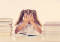 Frustrated little schoolgirl feeling a failure unable to concentrate in reading and writing difficulties learning problem Royalty Free Stock Photo
