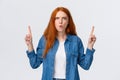 Frustrated and mad girlfriend want hear explanations, demand answer. Perplexed and angry tensed redhead woman speaking