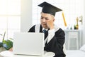 Frustrated male graduation trying to learn online at home