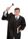 Frustrated male judge with gavel and book