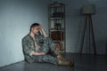 Frustrated military man with ptsd sitting