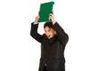 Frustrated modern businessman brandishing folder