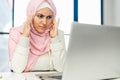 Frustrated overworked muslim businesswoman