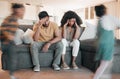 Frustrated parents, headache and children with stress in burnout, anxiety or depression in living room chaos at home