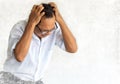 Frustrated senior man emotionally scratching his head with stress face. Royalty Free Stock Photo