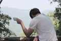 Frustrated stressed man holding coffee cup in his hands in nature background Royalty Free Stock Photo