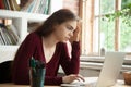 Frustrated stressed woman worried about work problem looking at Royalty Free Stock Photo