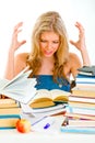 Frustrated teengirl with books tired of studying Royalty Free Stock Photo