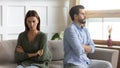 Frustrated thoughtful girlfriend ignoring boyfriend after quarrel, bad relationship Royalty Free Stock Photo