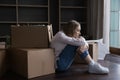 Frustrated tired former homeowner woman moving out from apartment Royalty Free Stock Photo