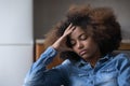 Frustrated unhappy African teen girl suffering from depression