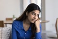 Frustrated unhappy young Indian woman thinking on bad news Royalty Free Stock Photo
