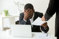 Frustrated upset african american employee receiving dismissal n Royalty Free Stock Photo