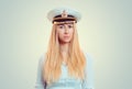 Frustrated woman in captain hat looking at you camera angry Royalty Free Stock Photo
