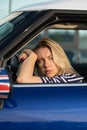 Frustrated woman driver in car wait for tow truck. Sad female tired of breaking vehicle sit on seat Royalty Free Stock Photo