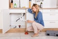 Frustrated Woman Having Kitchen Sink Problem Royalty Free Stock Photo